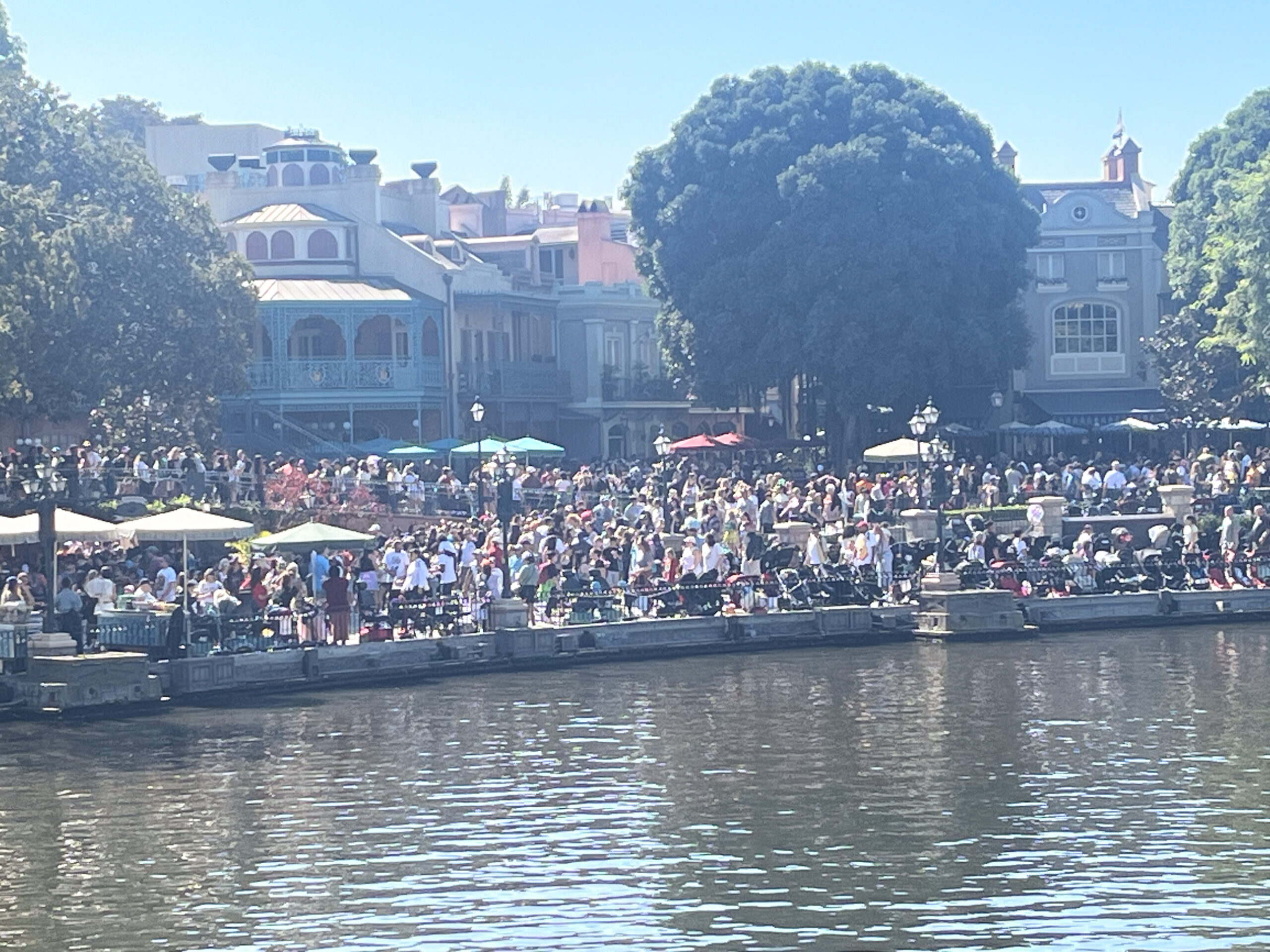 View of New Orleans Square from Mark Twain Riverboat when Disneyland is very crowded and busy